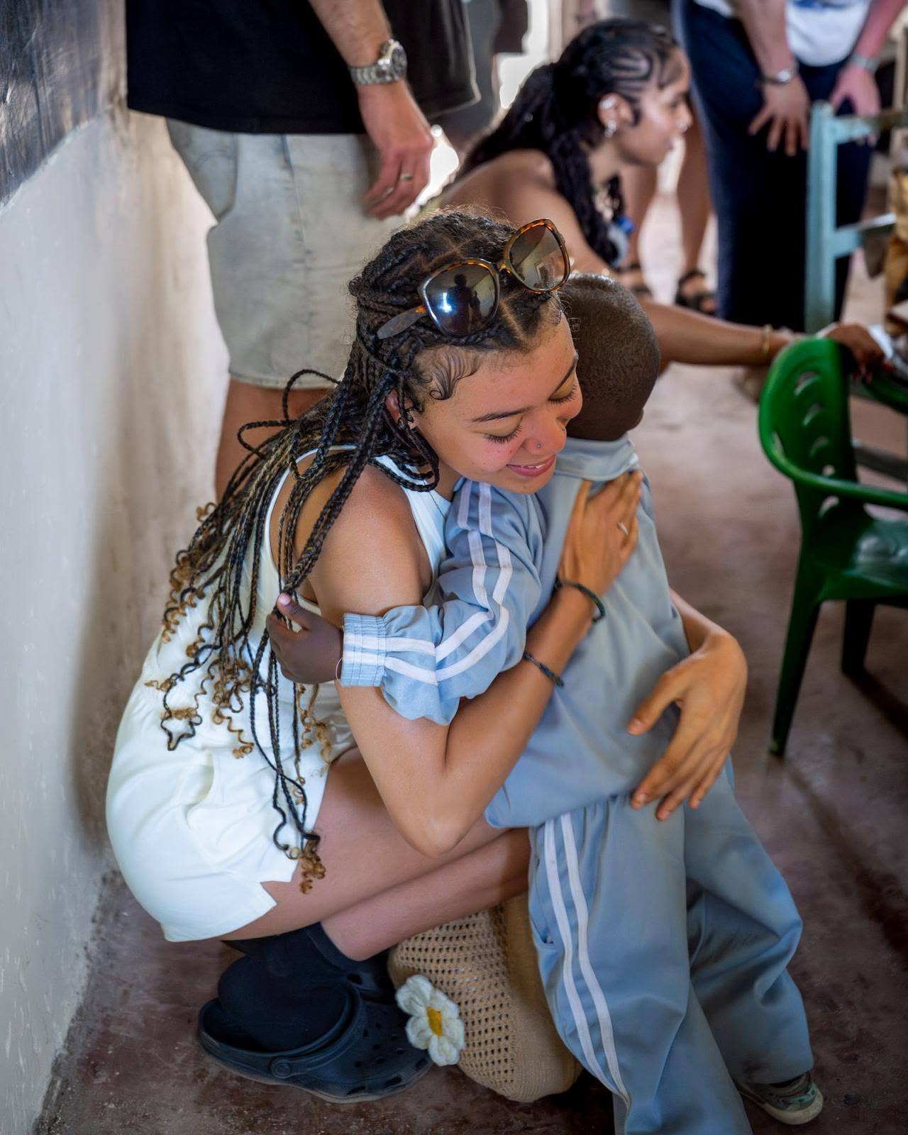 Volunteers working with children at Rain Edge International